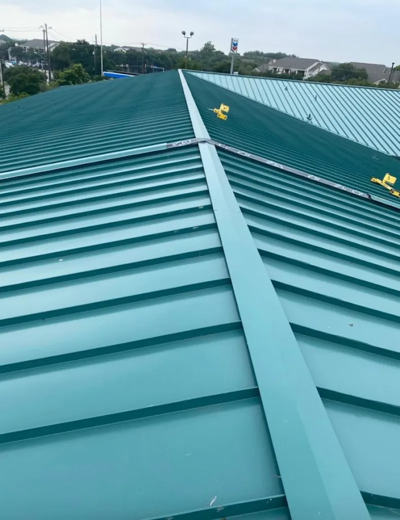 Green commercial metal roof ridge and valley for Metal Roof Repair in Morton